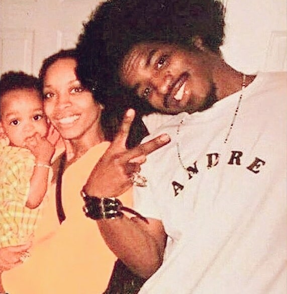 A picture of Eryka Badu with her son and her ex-boyfriend, Andre 3000.